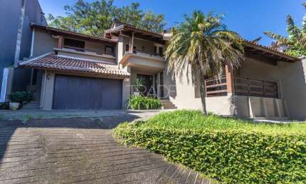 Casa com 3 quartos à venda na Rua Edgar Luiz Schneider, 510, Jardim Isabel, Porto Alegre por R$ 1.450.000