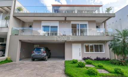 Casa em condomínio fechado com 4 quartos à venda na Rua Ivo Walter Kern, 599, Hípica, Porto Alegre por R$ 1.860.000