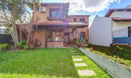Casa com 3 quartos à venda na rua imeram teixeira cabeleira, 174, ipanema, porto alegre por r$ 900.000