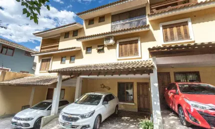 Casa em condomínio fechado com 3 quartos à venda na Rua General Rondon, 1489, Tristeza, Porto Alegre por R$ 580.000
