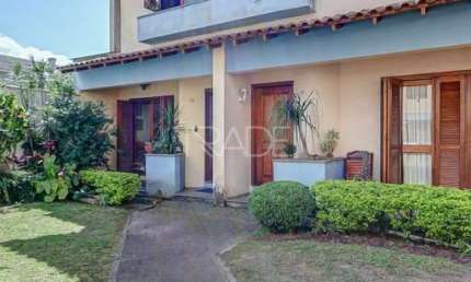 Casa em condomínio fechado com 3 quartos à venda na Rua Doutor Mário Totta, 416, Tristeza, Porto Alegre por R$ 630.000