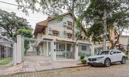 Casa em condomínio fechado com 3 quartos à venda na Rua João Mendes Ouriques, 594, Jardim Isabel, Porto Alegre por R$ 1.150.000
