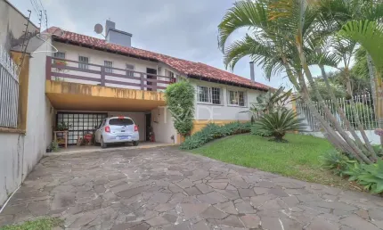 Casa com 4 quartos à venda na Nicola Rosito, 48, Jardim Isabel, Porto Alegre por R$ 990.000