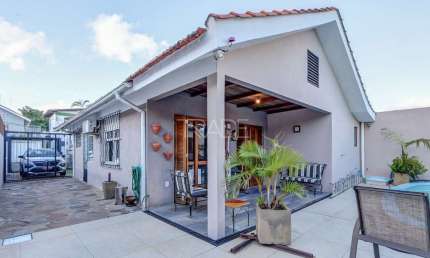 Casa com 3 quartos à venda na Rua Dário Totta, 3051, Cavalhada, Porto Alegre por R$ 599.000