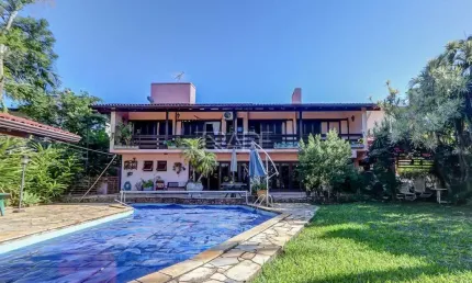 Casa em condomínio fechado com 3 quartos à venda na Avenida da Cavalhada, 5205, Cavalhada, Porto Alegre por R$ 2.700.000