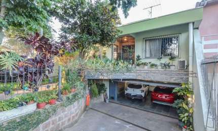 Casa com 3 quartos à venda na Rua Derocy Giácomo da Silva, 110, Vila Nova, Porto Alegre por R$ 649.000