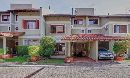 Casa em condomínio fechado com 3 quartos à venda na Rua Doutor Pereira Neto, 2057, Cavalhada, Porto Alegre por R$ 799.000