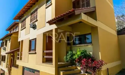 Casa em condomínio fechado com 3 quartos à venda na Rua General Rondon, 1256, Tristeza, Porto Alegre por R$ 875.000