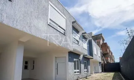 Casa em condomínio fechado com 3 quartos à venda na Rua Dário Totta, 2430, Camaquã, Porto Alegre por R$ 330.000