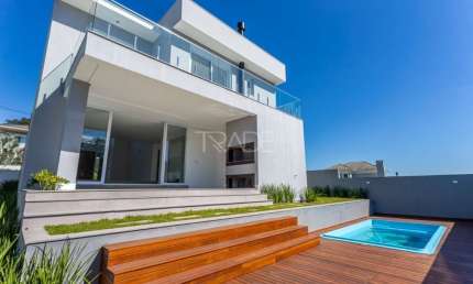 Casa em condomínio fechado com 4 quartos à venda na Estrada das Três Meninas, 2001, Vila Nova, Porto Alegre por R$ 2.390.000