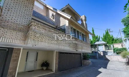 Casa em condomínio fechado com 3 quartos à venda na Rua Doutor Arnaldo da Silva Ferreira, 450, Jardim Isabel, Porto Alegre por R$ 1.300.000
