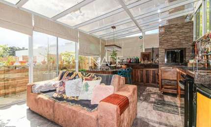 Casa em condomínio fechado com 4 quartos à venda na Rua Morano Calabro, 51, Jardim Isabel, Porto Alegre por R$ 1.300.000