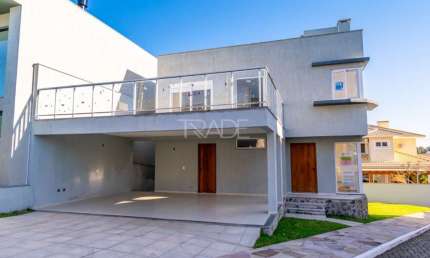 Casa em condomínio fechado com 3 quartos à venda na Rua Ivo Walter Kern, 599, Hípica, Porto Alegre por R$ 1.080.000
