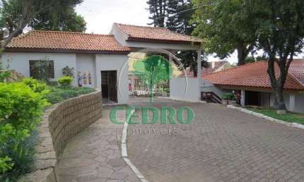 Casa em condomínio fechado com 4 quartos à venda na Rua Martim Afonso, 115, Santo Antônio, Porto Alegre por R$ 520.000