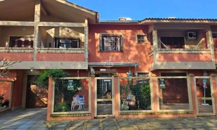Casa em condomínio fechado com 2 quartos à venda na Rua Rio Carreiro, 771, Centro, Xangri-Lá por R$ 660.000
