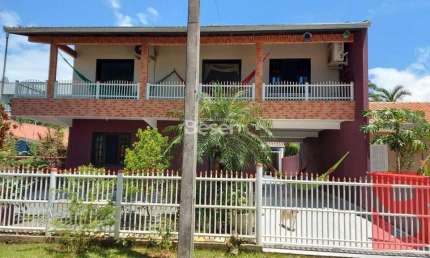 Excelente sobrado  com área total 207,00 m² - Balneário Brasília- Face Leste- 04 Dormitórios (sendo 01 suíte)