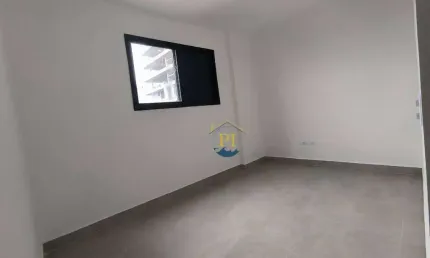 Apartamento com 2 dormitórios à venda, 71 m² por R$ 550.000,00 - Vila Guilhermina - Praia Grande/SP