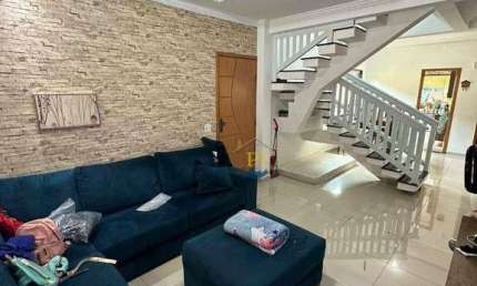 Sobrado com 3 dormitórios à venda, 143 m² por R$ 720.000,00 - Canto do Forte - Praia Grande/SP