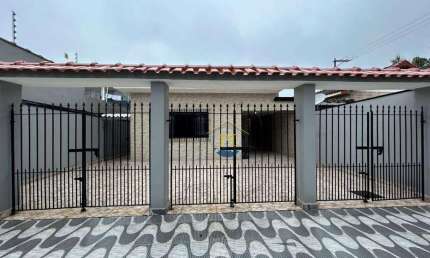 Casa com 3 dormitórios à venda, 100 m² por R$ 580.000 - Maracanã - Praia Grande/SP