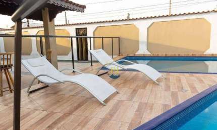 Casa com 4 dormitórios à venda, 175 m² por R$ 1.300.000 - Mirim - Praia Grande/SP