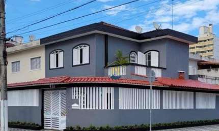 Sobrado com 3 dormitórios à venda, 100 m² por R$ 1.000.000,00 - Vila Assunção - Praia Grande/SP