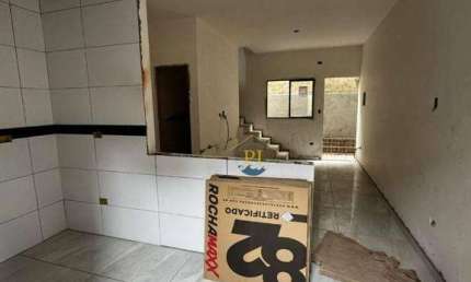 Casa com 2 dormitórios à venda, 55 m² por R$ 299.900,00 - Vila Guilhermina - Praia Grande/SP