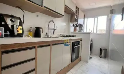 Apartamento com 2 dormitórios à venda, 52 m² por R$ 440.000 - Caiçara - Praia Grande/SP