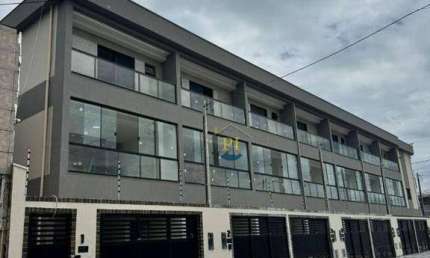 Casa com 2 dormitórios à venda, 89 m² por R$ 469.000 - Maracanã - Praia Grande/SP