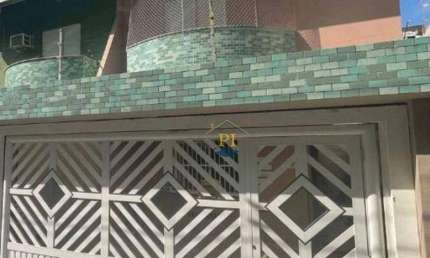 Casa com 3 dormitórios à venda, 105 m² por R$ 720.000 - Tupi - Praia Grande/SP