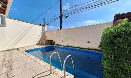 Casa com 2 dormitórios à venda, 100 m² por R$ 550.000,00 - Caiçara - Praia Grande/SP