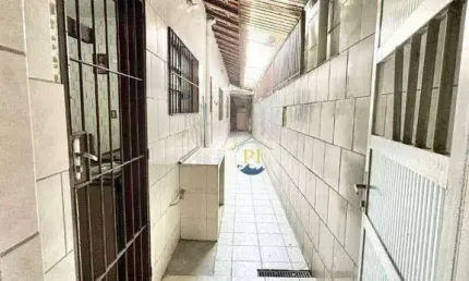 Casa com 2 dormitórios à venda, 70 m² por R$ 380.000 - Caiçara - Praia Grande/SP