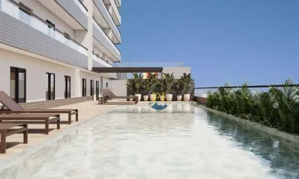 Apartamento com 2 dormitórios à venda, 71 m² por R$ 488.000 - Caiçara - Praia Grande/SP