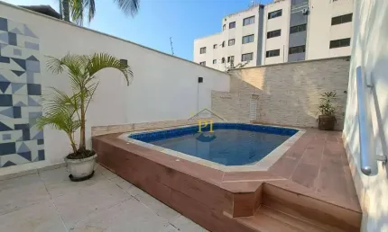 Sobrado com 3 dormitórios à venda, 140 m² por R$ 690.000,00 - Aviação - Praia Grande/SP