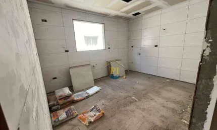 Casa com 3 suítes à venda, 93 m² por R$ 570.000 - Vila Guilhermina - Praia Grande/SP