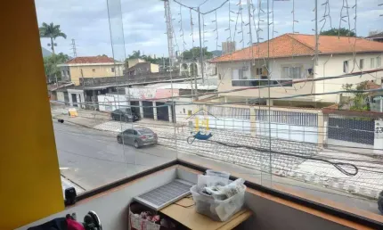 Sobrado com 3 dormitórios à venda, 156 m² por R$ 900.000 - Tude Bastos (Sítio do Campo) - Praia Grande/SP