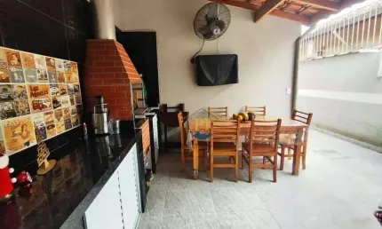 Casa com 3 dormitórios à venda, 113 m² por R$ 545.000,00 - Maracanã - Praia Grande/SP
