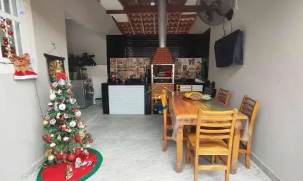 Casa com 3 dormitórios à venda, 113 m² por R$ 545.000 - Maracanã - Praia Grande/SP