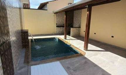 Casa com 3 dormitórios à venda, 145 m² por R$ 895.000 - Vila Caiçara - Praia Grande/SP