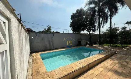 Casa com 3 dormitórios à venda, 100 m² por R$ 900.000 - Maracanã - Praia Grande/SP