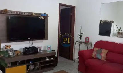Casa com 2 dormitórios à venda, 80 m² por R$ 575.000 - Tupi - Praia Grande/SP