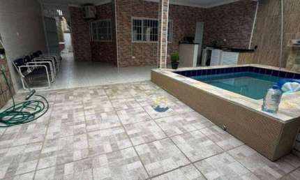 Casa com 3 dormitórios à venda, 128 m² por R$ 1.300.000 - Solemar - Praia Grande/SP