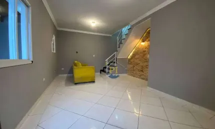 Sobrado com 3 dormitórios à venda, 110 m² por R$ 770.000 - Boqueirão - Praia Grande/SP