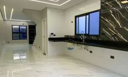 Sobrado com 3 dormitórios à venda, 150 m² por R$ 945.000 - Maracanã - Praia Grande/SP