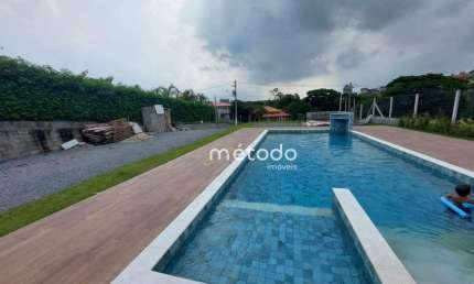 Casa com 4 dormitórios à venda, 280 m² por R$ 850.000,00 - Condomínio Residencial Urbanova - Guararema/SP
