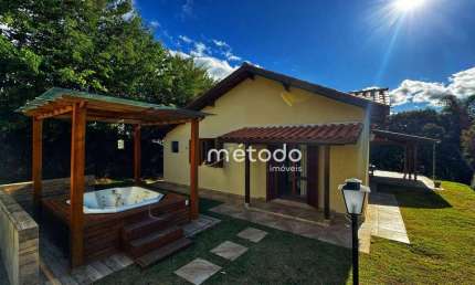 Casa com 3 dormitórios à venda, 174 m² por R$ 1.100.000,00 - Condomínio Residencial Granja Virginia - Guararema/SP