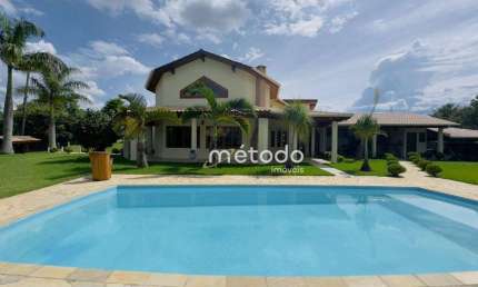 Casa com 3 dormitórios à venda, 298 m² por R$ 2.700.000 - Condomínio Residencial Alpes de Guararema - Guararema/SP