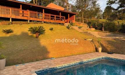 Casa com 3 dormitórios à venda, 130 m² por R$ 1.190.000 - Condomínio Residencial Alpes de Guararema - Guararema/SP