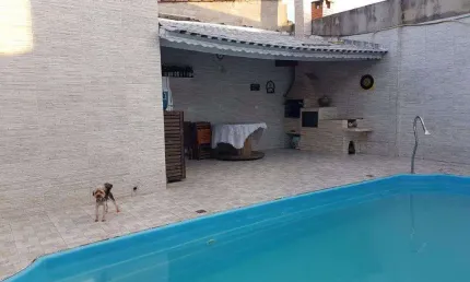 Sobrado com 4 dormitórios à venda, 320 m² por R$ 1.400.000,00 - Maracanã - Praia Grande/SP
