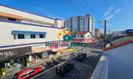Apartamento Quitinete para locação em Mongaguá, centro da cidade, 1 dormitório, ampla sacada, próximo a comércios de diversos segmentos
