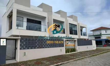 Sobrado geminado e novo em Mongaguá, bairro Vera Cruz, 2 dormitórios sendo 2 suítes, vagas para veículo e moto, excelente padrão e localização.